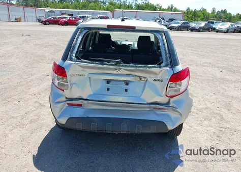 2010 Suzuki Sx4 Technology z USA, uszkodzony, nr VIN JS2YA5A37A6300161